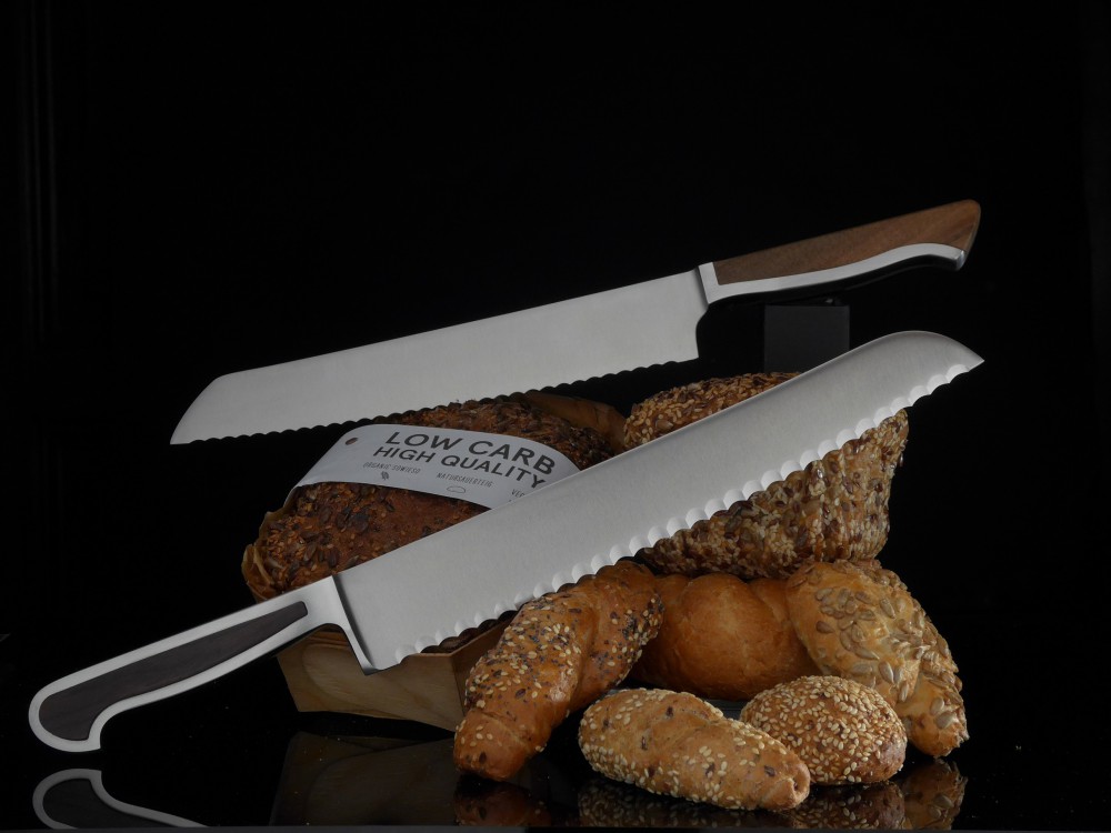 #slidebild2 Messer Wien Brotmesser der Firma Güde aus Solingen. Serien: Caminada (oben) und Delta. kochmesser guede brotmesser delta caminada solingen
