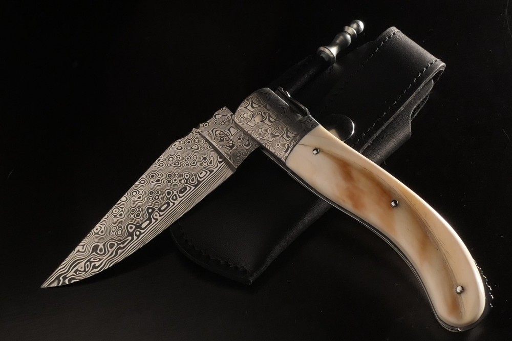 Messer Wien  franzoesische-taschenmesser-fontenille-pataud-damasteel-damastbacken-warzenschweinhauer-phacochere-backlock-rostfrei