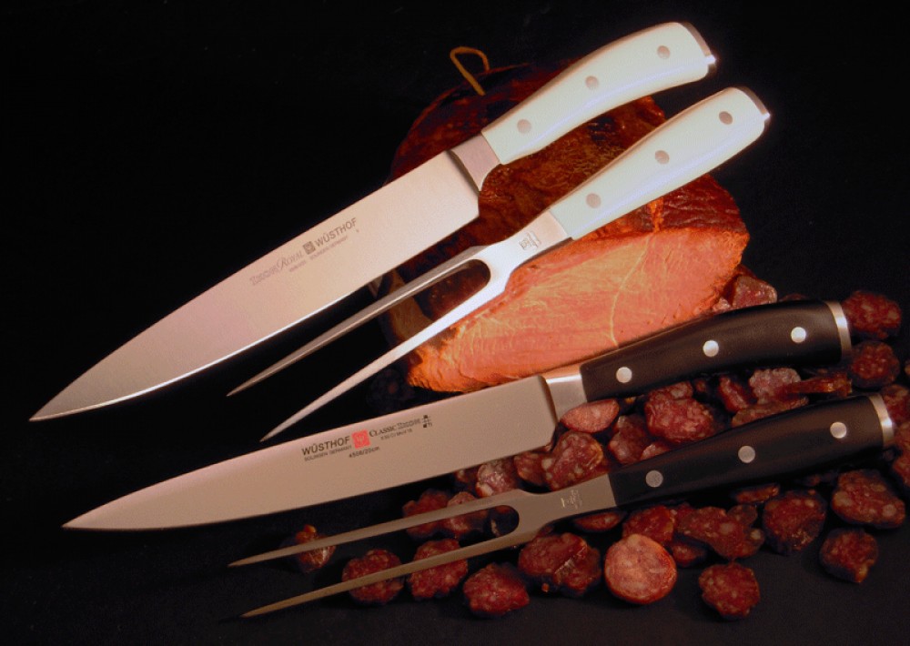 Messer Wien Wunderbar zum Aufschneiden von Braten ist das Tranchierbesteck von W�sthof. Das Fleischmesser und die Fleischgabel sind auch separat erh�ltlich. w�sthof, dreizack, solingen, solinger stahlwaren, k�chenmesser, kochmesser, ikon, schwarz, wei�, Tranchierbesteck, Klingen-Boutique Messer Wien Graz